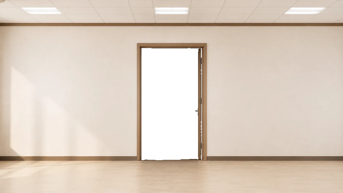 A bright corridor wall with an open classroom door
